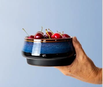 Midnight Tide Bowl held in one hand